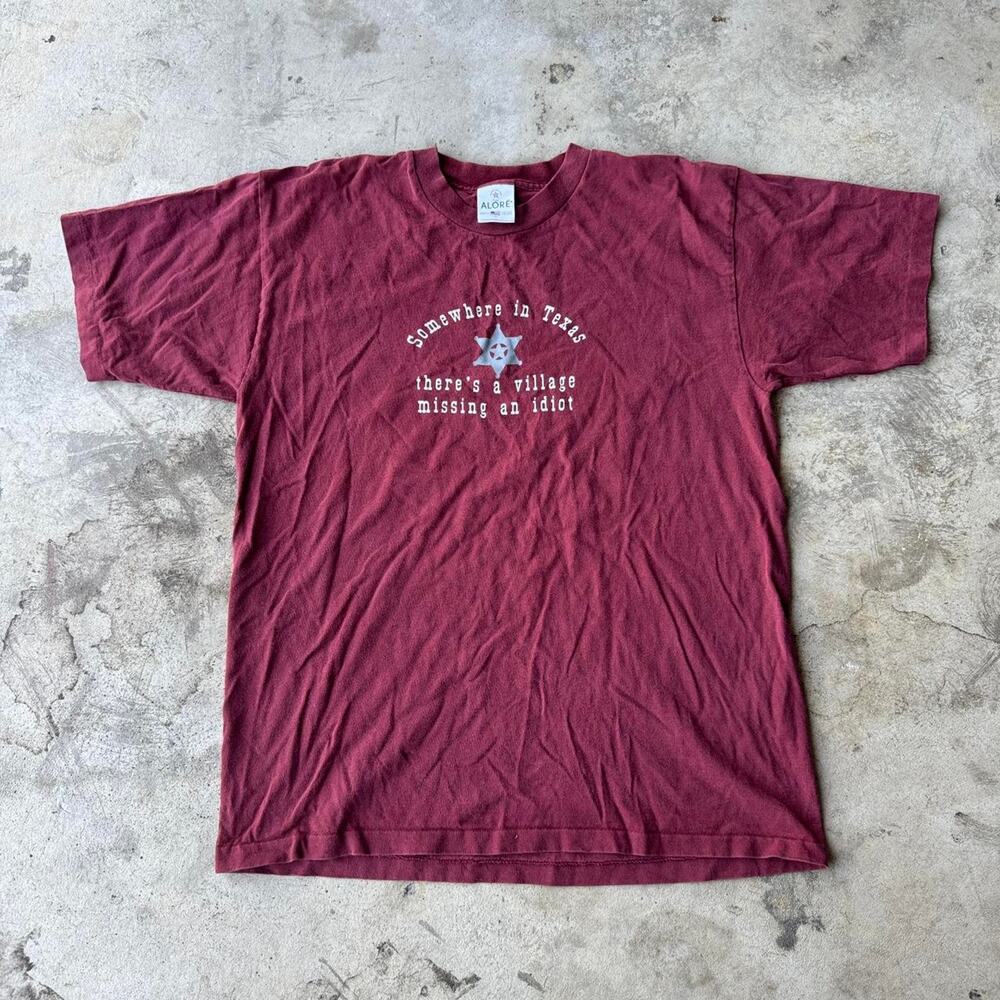 Vintage 90s somewhere in Texas theres a village missing a idiot funny tee shirt